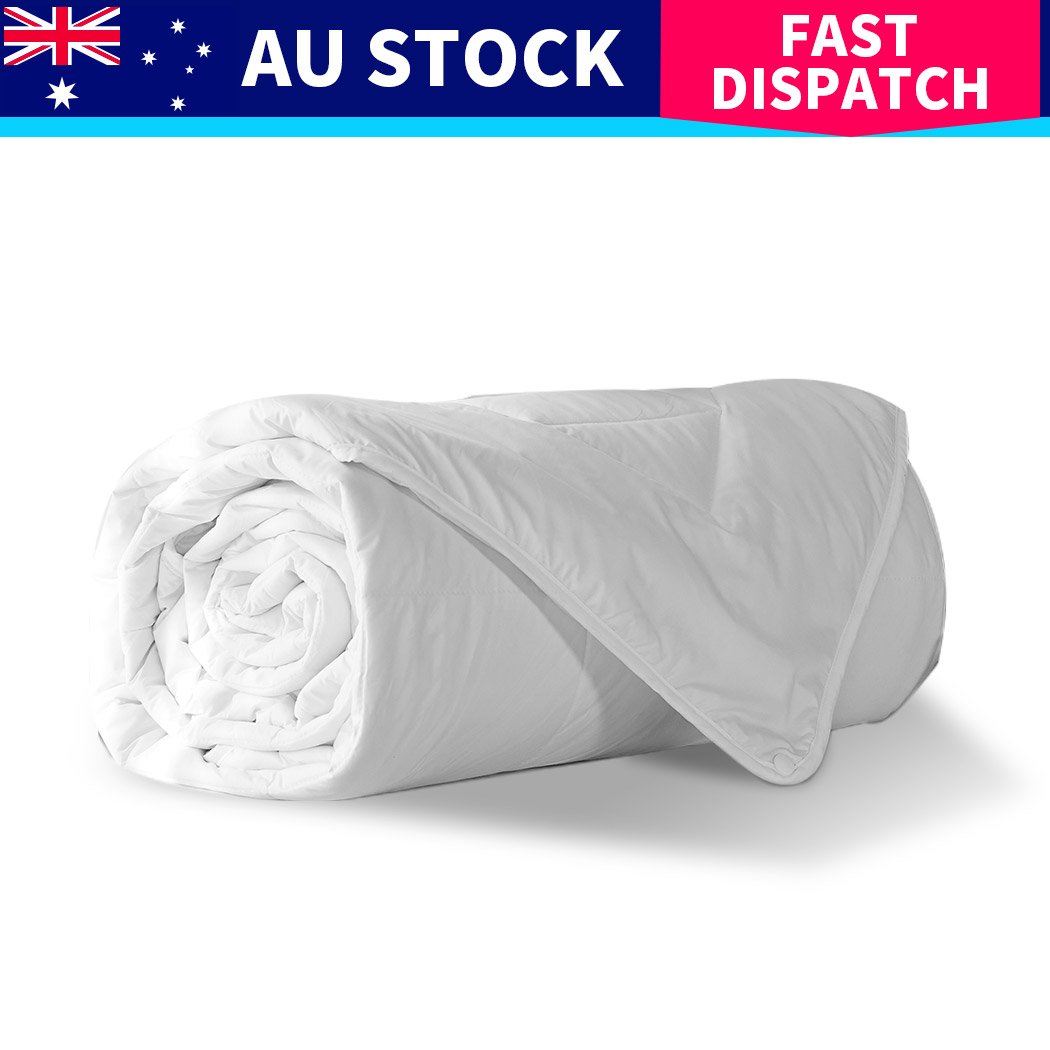 DreamZ 100% Wool Quilt in white, showcasing diamond stitching and soft cotton cover, perfect for all seasons.